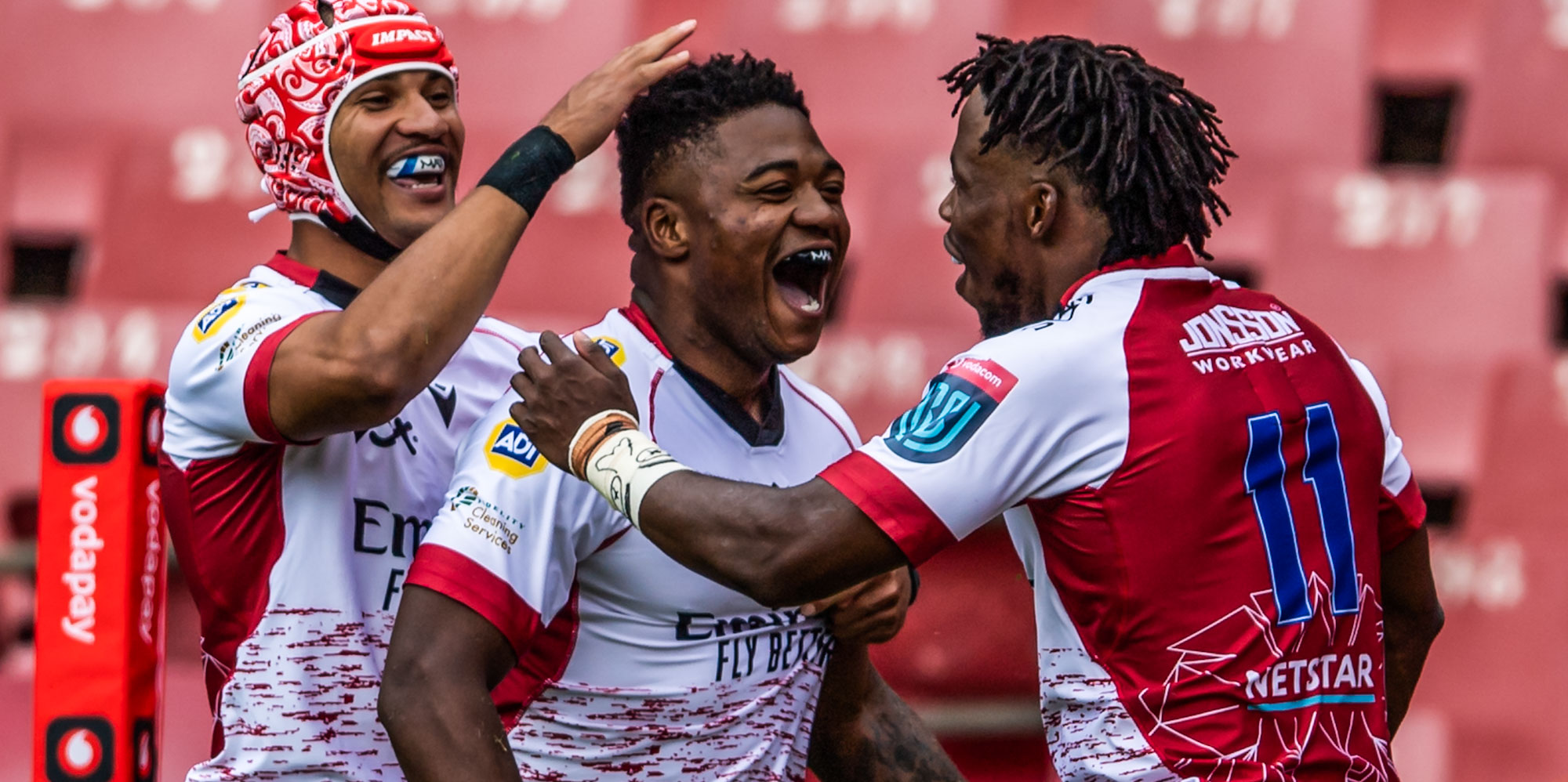 Wandisile Simelane celebrate a try with his Emirates Lions team-mates Edwill van der Merwe (left) and Rabz Maxwane (right).