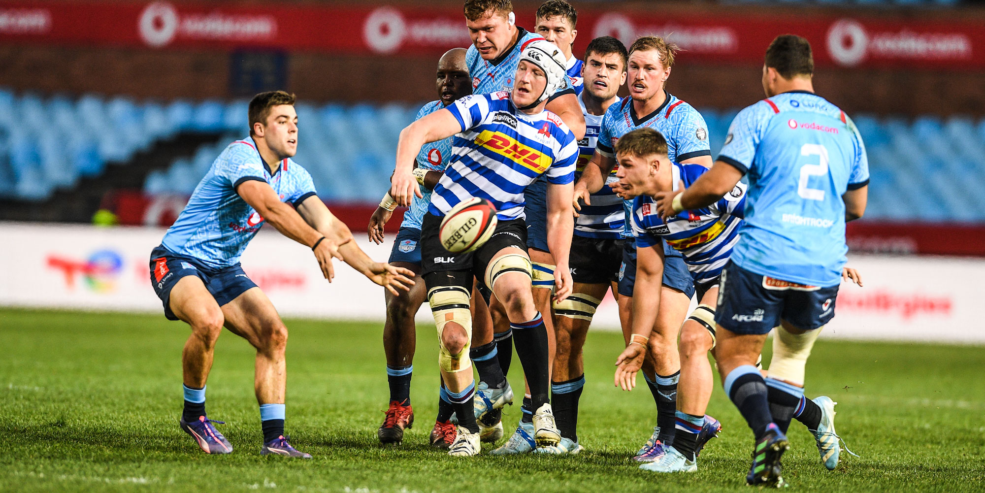 Zak Burger gets the ball away under pressure from DHL WP.